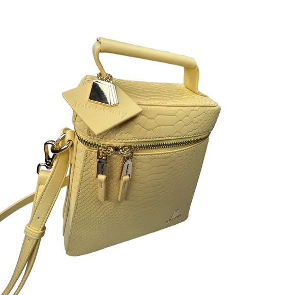 Tote & Carry Apollo 1 Canary Yellow
Cowbell Backpack and Croosbody New with tags - Picture 8 of 15